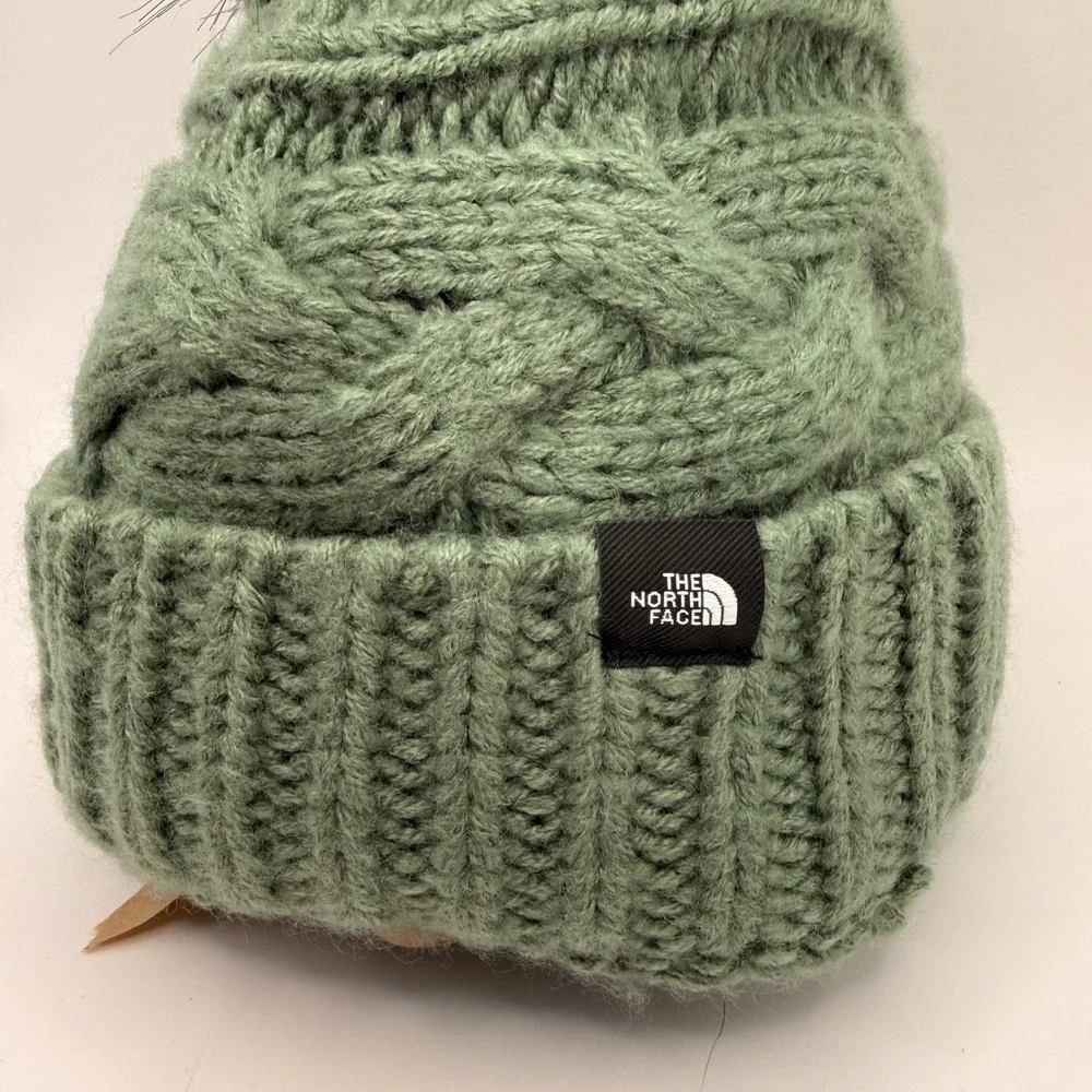 The North Face Kids Triple Cable Beanie Laurel Wreath Green Faux Fur Pom Pom‎